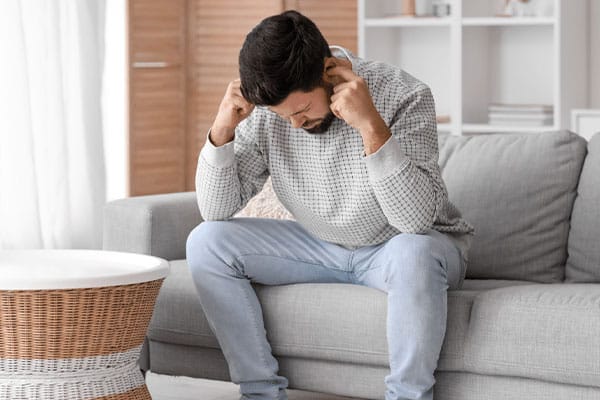 a person sitting on a couch