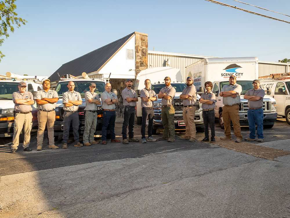 a group of people standing in a parking lot